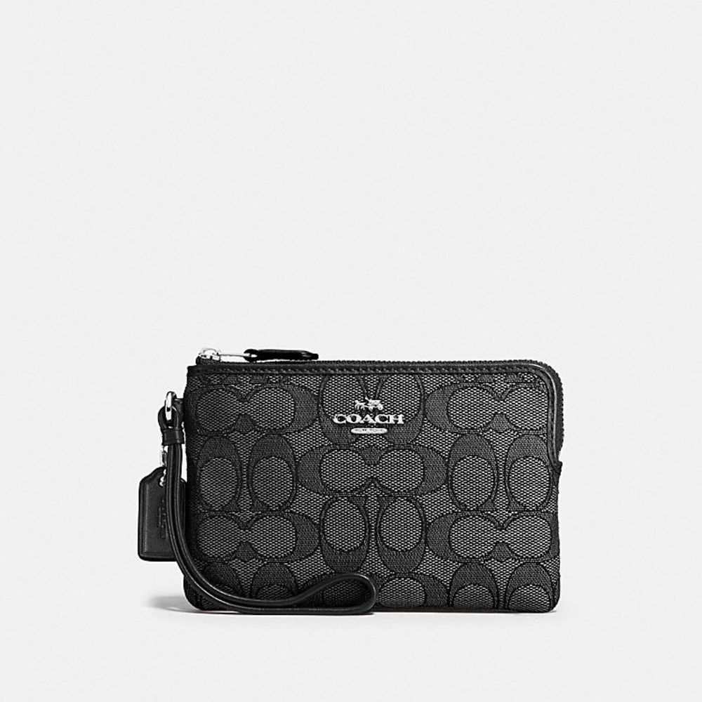NEW CORNER ZIP WRISTLET IN SIGNATURE CANVAS